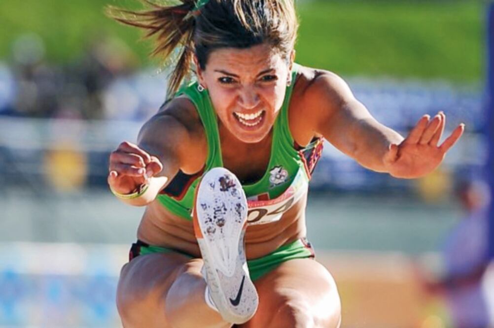 La atleta regia de 27 años alcanzó los 6.70 metros en el salto de longitud (KELLEY L COX. USA TODAY SPORTS)