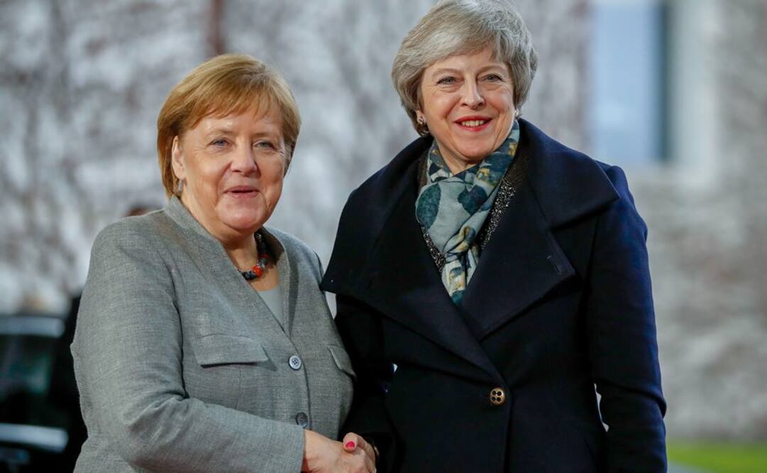 La primera ministra de Reino Unido, Theresa May, se reunió el martes con Angela Merkel (Foto: AFP)