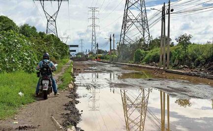Lluvias complican colocación de concreto hidráulico en Tultitlán