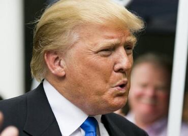 Trump says he has been 'a little bit divisive' in Republican race