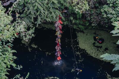Sacan casi una tonelada de basura en cenote de Sotuta, Yucatán