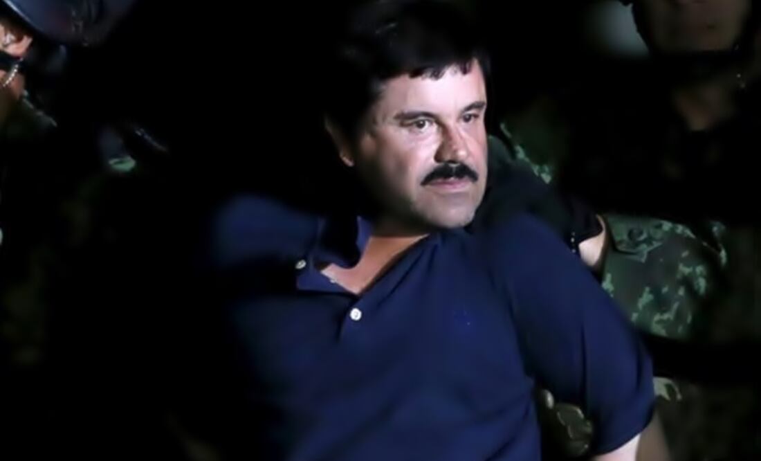 Guzmán is escorted by soldiers after his capture. (Photo: AP)