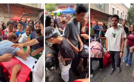 Polémica por video viral de Alex Serrano; transeúntes rompen la caja de regalos y se llevan el dinero en plena vía pública