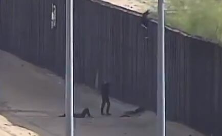 Migrantes caen 5 metros al cruzar muro fronterizo; niña se lesiona la espalda