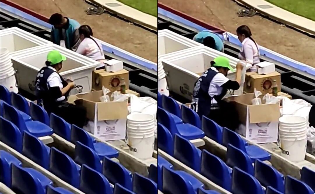 Vendedora de cerveza limpiando vasos en el estadio Cuauhtémoc - FOTO: Especial