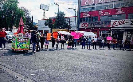 Vendedores ambulantes bloquean circulación de la México-Cuernavaca; rechazan ser reubicados en mercado de Tlalpan
