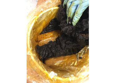 Hallan 3 kilos de marihuana en cubeta con mole en Veracruz