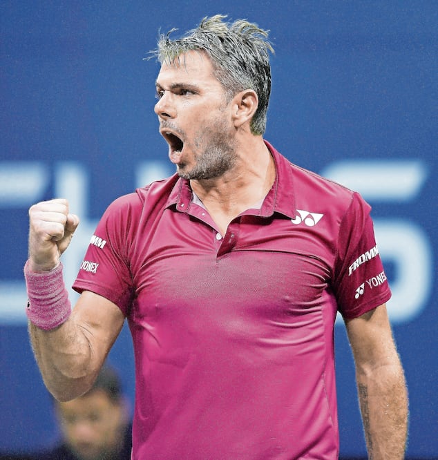 Wawrinka batalló para imponerse en cuatro sets a Kei Nishikori (DANIEL MURPHY. EFE)