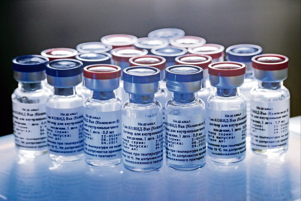 A new vaccine is on display at the Nikolai Gamaleya National Center of Epidemiology and Microbiology in Moscow, Russia - Photo:  Alexander Zemlianichenko Jr/Russian Direct Investment Fund via AP
