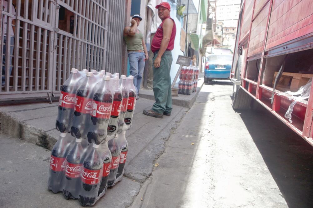Una de las víctimas llevaba trabajando sólo 15 días en el reparto de productos Coca-Cola. (ARCHIVO EFE)