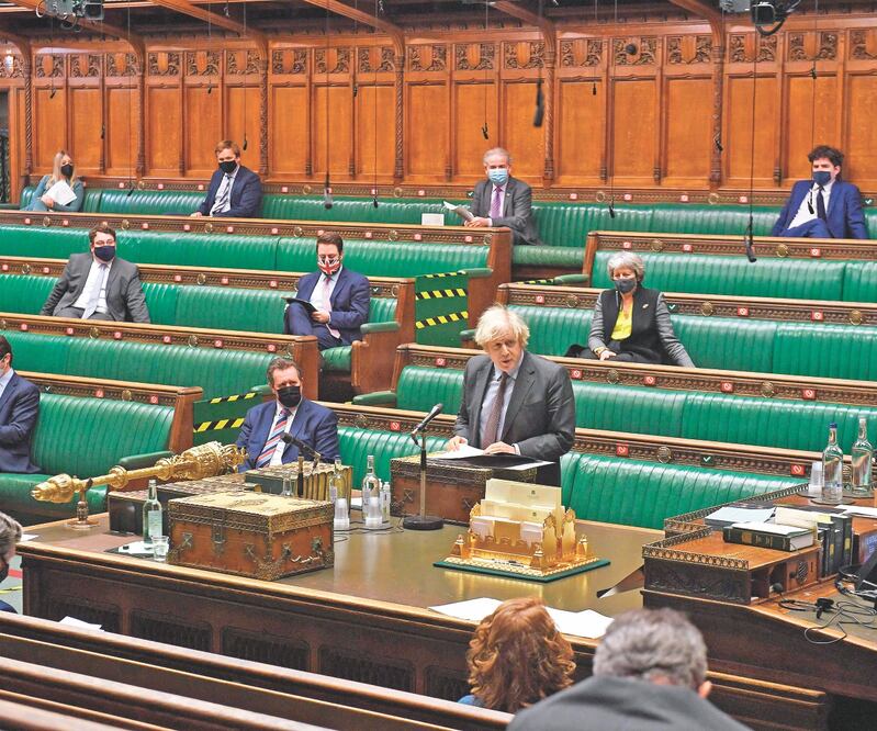 El premier británico, Boris Johnson, dio a conocer al Parlamento, en Londres, su plan calendarizado sobre el desconfinamiento. Foto: JESSICA TAYLOR. AFP