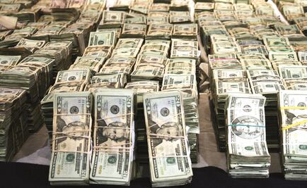 Pareja halla boleto de lotería premiado con 1,8 mdd al limpiar su casa