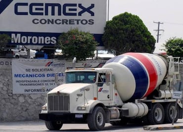 Cemex lifts cash flow target, may sell more assets