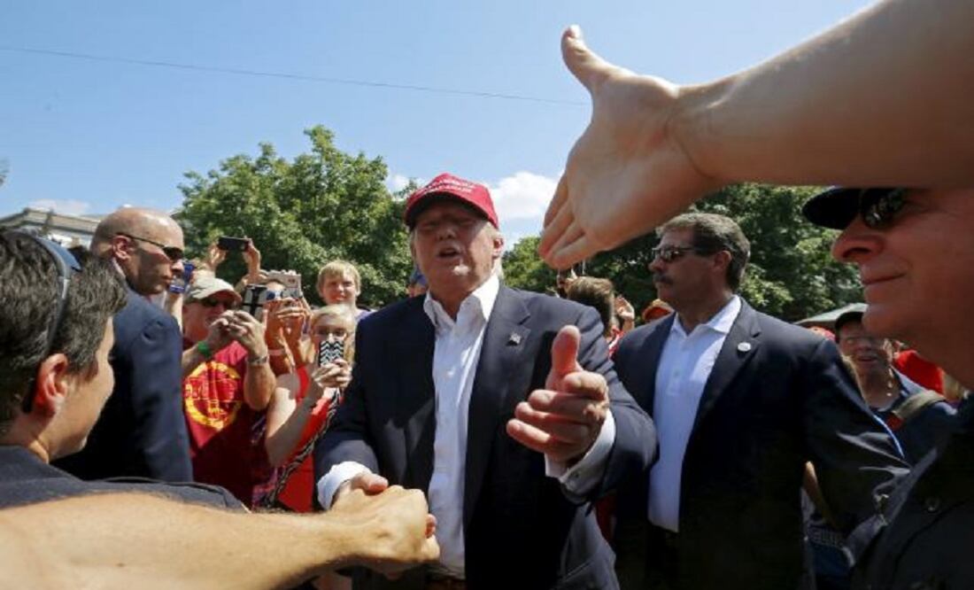 Donald Trump greets attendees at the Iowa State Fair during a campaign stop in Des Moines, Iowa. (Photo: Reuters)