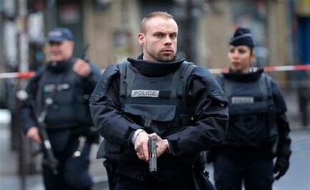Man in fake explosives vest killed amid high Paris tension