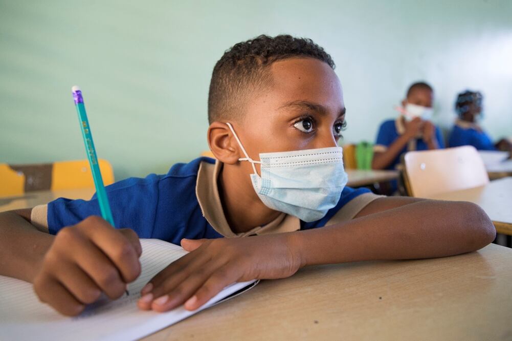Primer día de clases presenciales, luego de la pandemia por el Covid-19. Foto: EFE, archivo