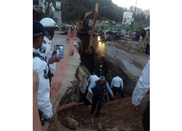 Derrumbe en Huixquilucan deja trabajadores atrapados
