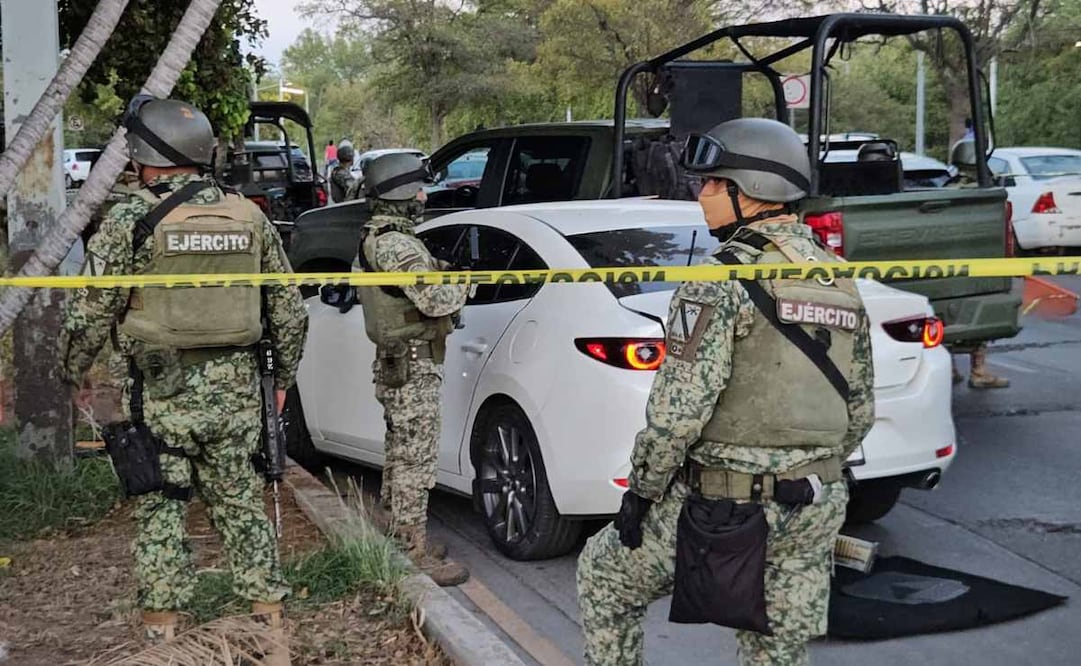 Los cuerpos de dos personas del sexo masculino atados de pies y manos con impactos de bala, en Culiacán, Sinaloa. Foto: Especial