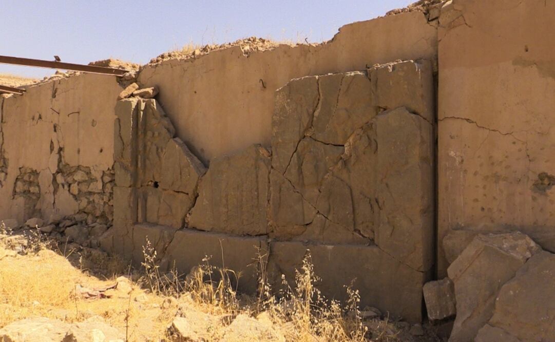 Fotografía de la pared de una construcción destruida por los yihadistas en la ciudad histórica de Nimrud. Foto: EFE