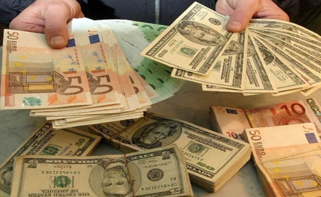 Dólar baja 9 centavos; cierra en $15.92