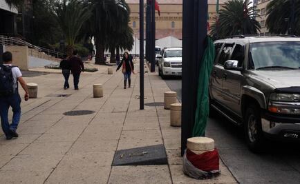 Captan bandera tirada en Monumento a la Revolución