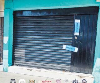 Catean oficina en Morelos; hallan permisos vehiculares falsos