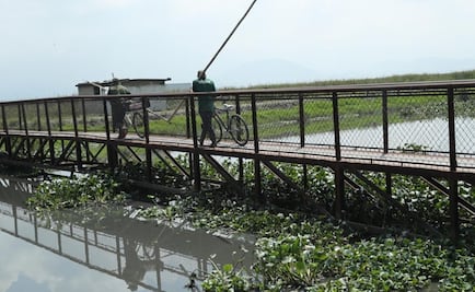 Colocan costales cerca del Río Lerma para evitar escurrimientos 