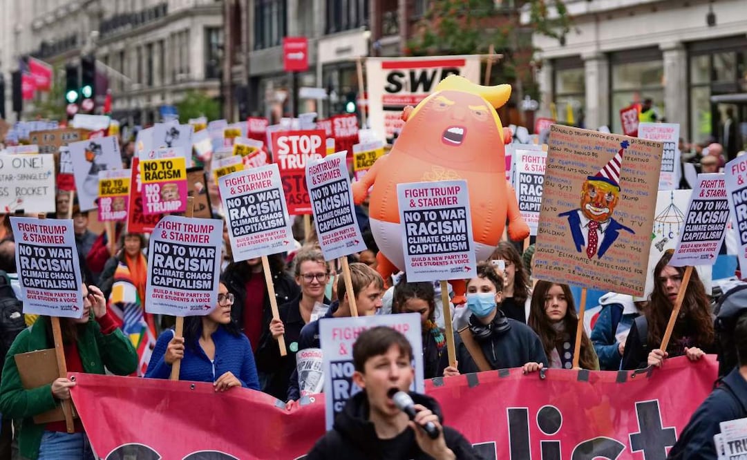 Asistentes a una manifestación contra la visita de Estado del presidente Donald Trump en Londres. Foto: Joanna Chan / AP