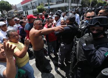 Enfrentamiento entre comerciantes y policías deja 6 detenidos y 7 heridos en Toluca