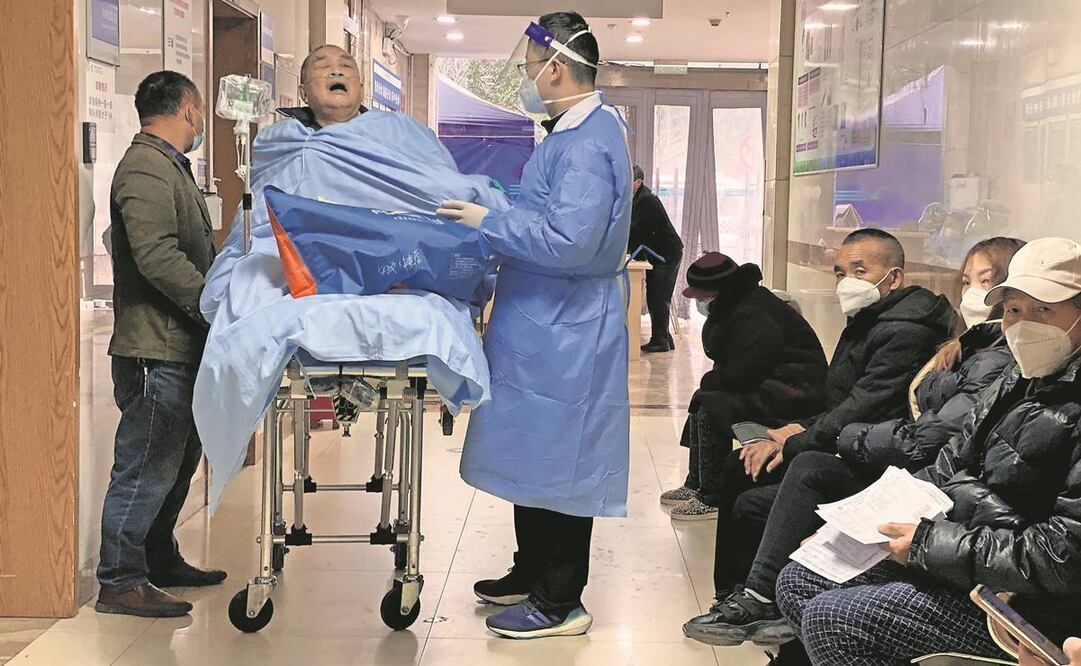 Un paciente de Covid-19, en Chongqing, en China. Foto: Noel Celis/ AFP