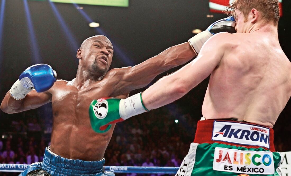 En 2013 Floyd Mayweather hizo ver mal a Saúl Álvarez (FOTOS. ARCHIVO. EL UNIVERSAL)