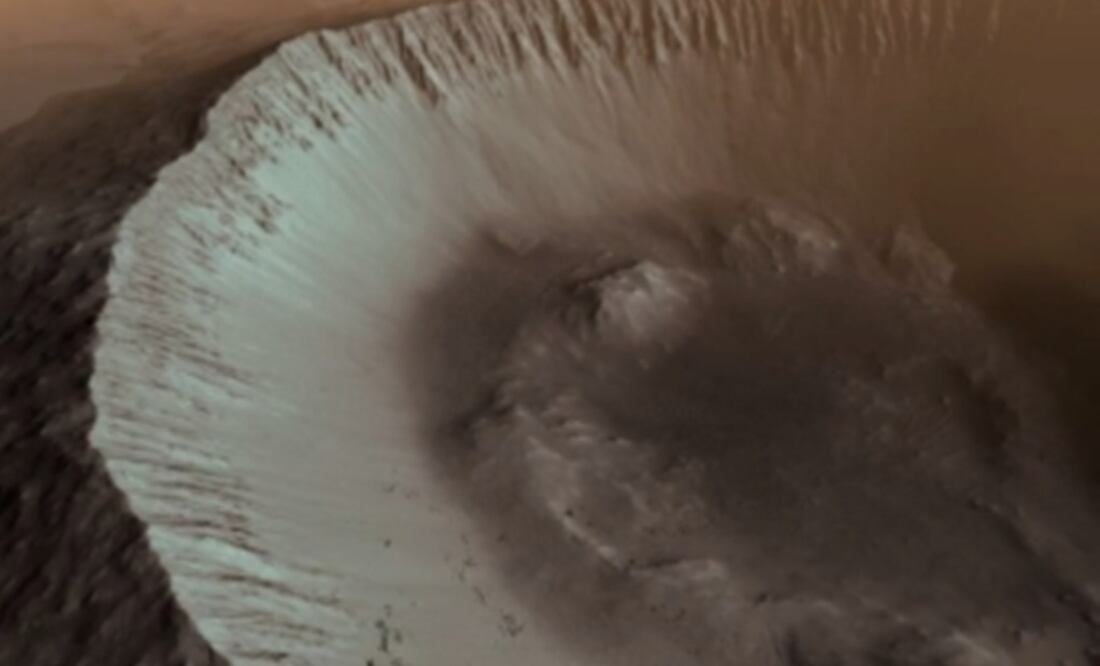 Cráter de 5.5 km de diámetro ubicado en la llanura volcánica de Hesperia. Foto: E.Simioni, G.Cremonese, INAF de Padua