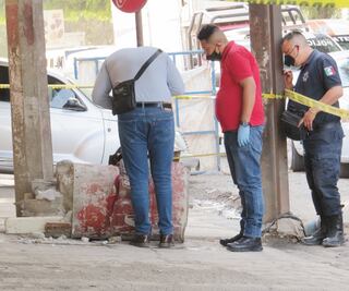 Encuentran restos humanos en un tambo en la México-Texcoco