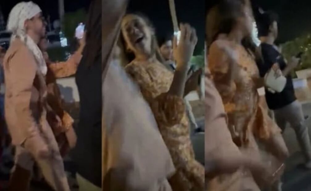 Bad Bunny reaparece en público con el rostro completamente tapado y una misteriosa mujer