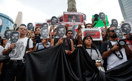 Mexico questions officials in journalist, activist killings