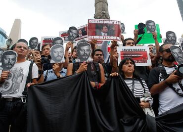 Mexico questions officials in journalist, activist killings