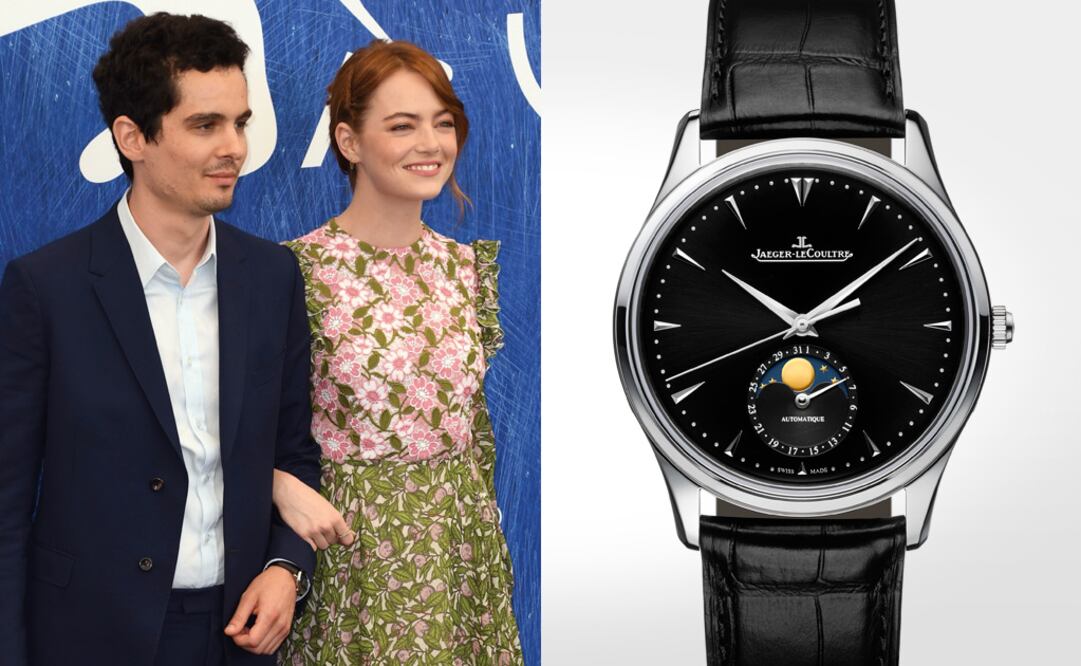 Damien Chazelle, director de la cinta 'La La Land' en compañía de Emma Stone, muestra en la muñeca un Jaeger-LeCoultre Master Ultra Thin Moon.
