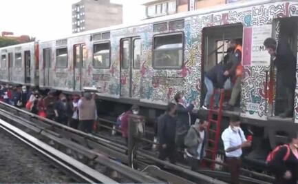 Evacuan a mil 400 personas por corto circuito en la Línea 2 del Metro