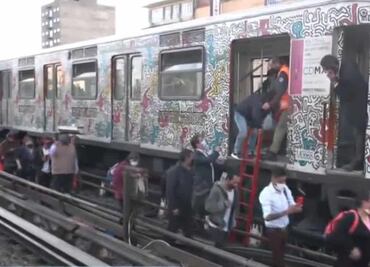Evacuan a mil 400 personas por corto circuito en la Línea 2 del Metro