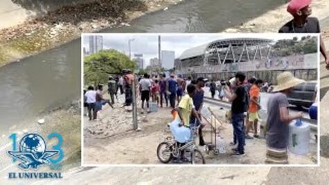 Por escasez, venezolanos recogen agua en río contaminado