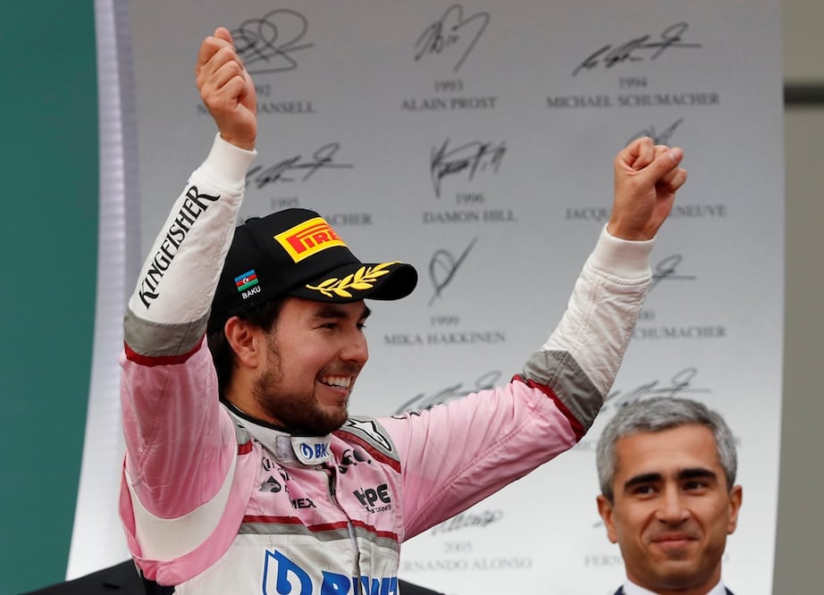 Sergio Perez celebrating on the podium after finishing third - Photo: David Mdzinarishvili/ REUTERS