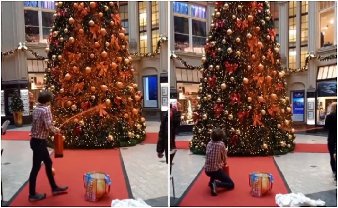 Miembros del movimiento climático Letzte Generation rocían un árbol de Navidad en Alemania. Foto: Tomada del video
