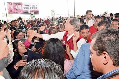 Comerciantes que siguen al candidato Del Mazo  
