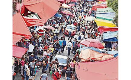 Balean a dos líderes tianguistas en Neza; muere uno