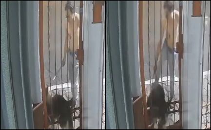 VIDEO: Captan a sujeto golpeando a un perro atorado en una reja en Puebla