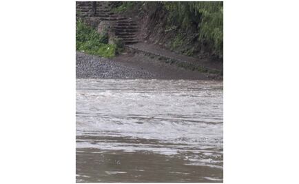 Muere menor arrastrado por corriente de río en NL