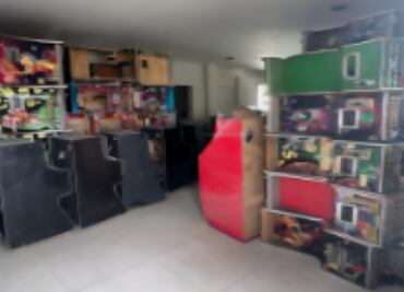 Aseguran más de 300 máquinas tragamonedas y armas en Culiacán; bodega operaba como centro de juegos clandestinos