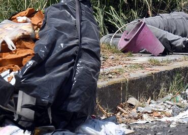 Entre basura, hallan cadáver de una joven con signos de violencia en Naucalpan