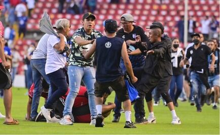FMF abre carpeta de investigación tras riña en partido de Querétaro y Atlas