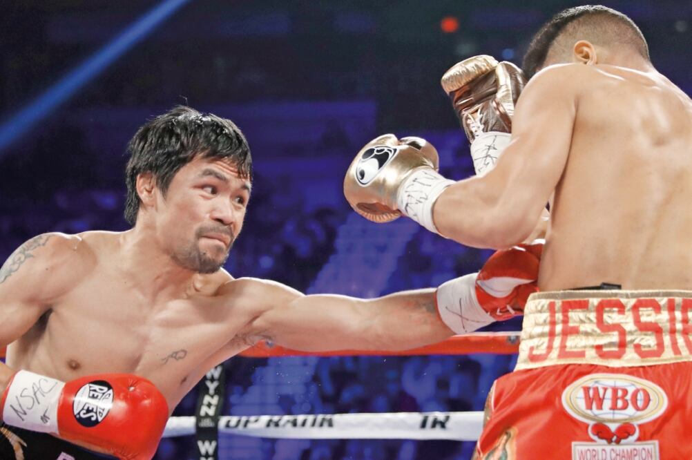 Aunque Jessie le aguantó toda la ruta al filipino, éste fue más certero al conectar golpes. (FOTO: ISAAC BREKKEN. AP)
